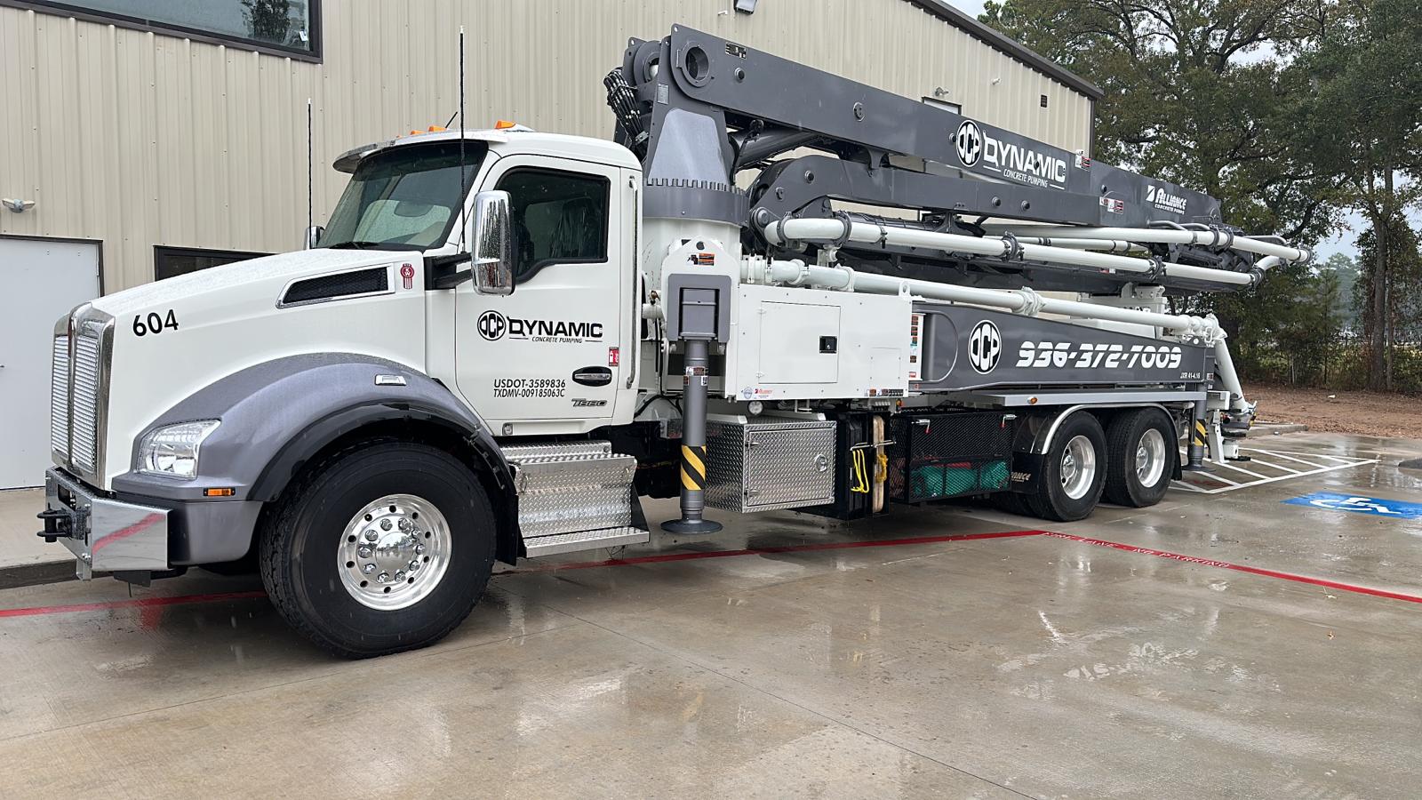 Dynamic Concrete Pumping boom pump truck on a residential pour